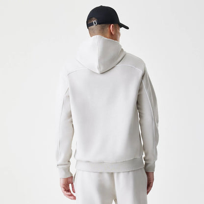 The Male model is wearing LA Lakers NBA Piping Cream Oversized Pullover Hoodie 2