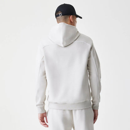 The Male model is wearing LA Lakers NBA Piping Cream Oversized Pullover Hoodie  2