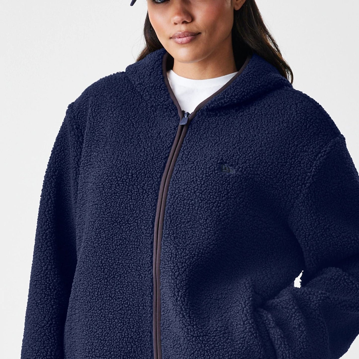 The Male model is wearing  New Era Navy Hooded Sherpa Jacket  6
