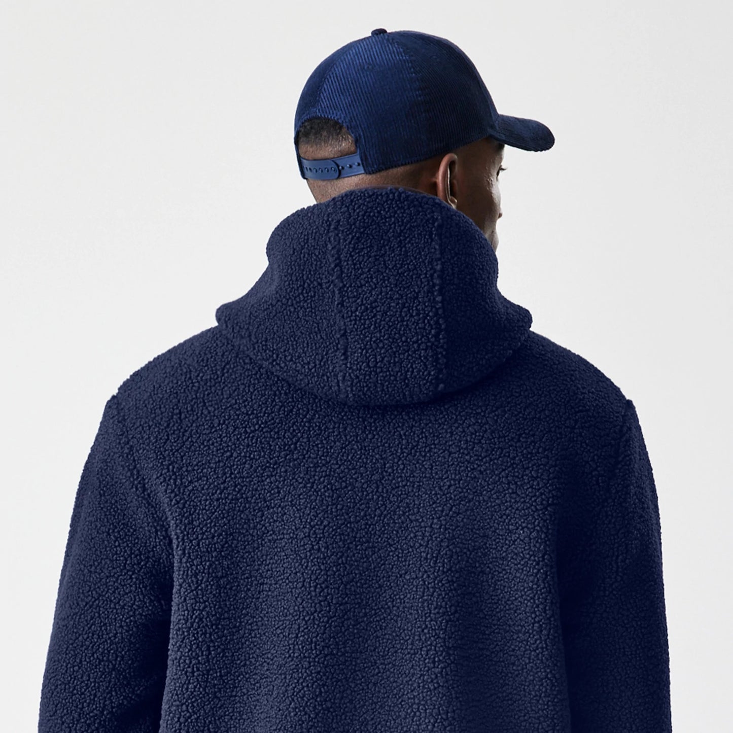 The Male model is wearing  New Era Navy Hooded Sherpa Jacket 8