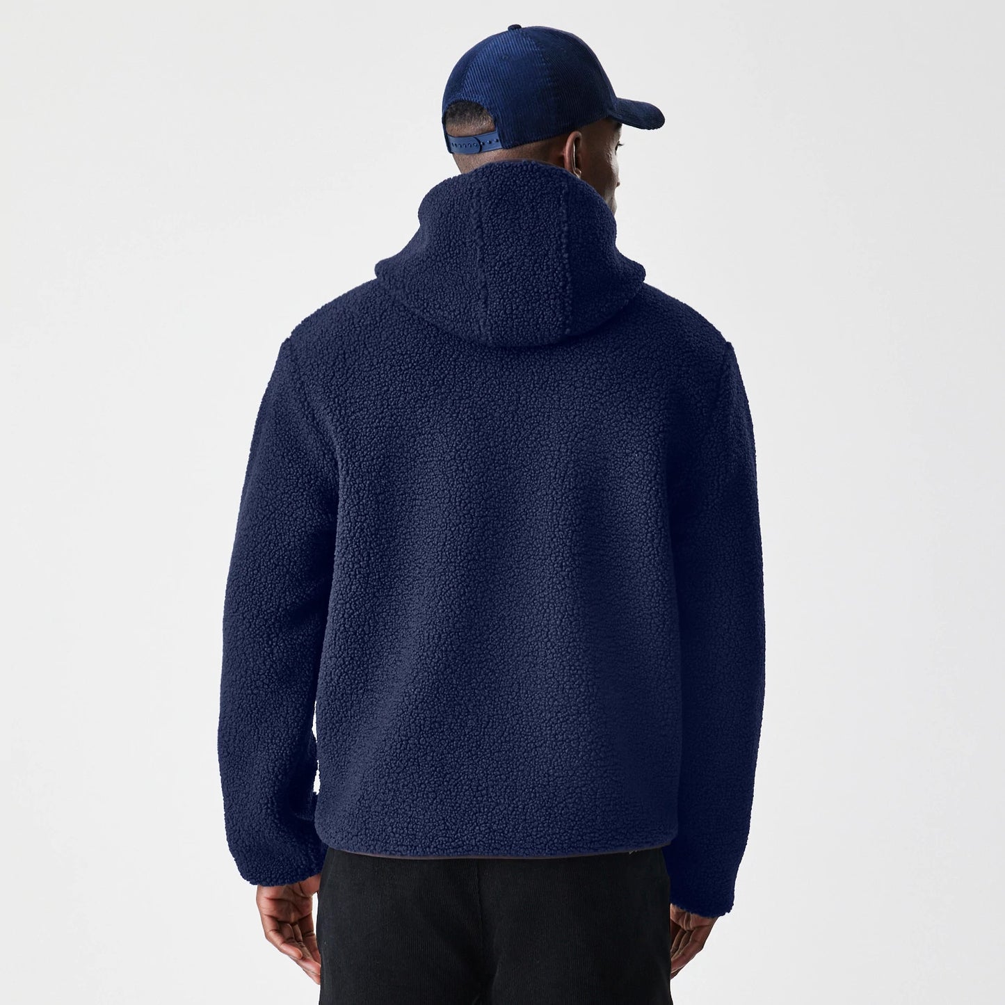 The Male model is wearing  New Era Navy Hooded Sherpa Jacket 2