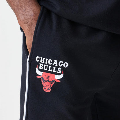 The Male model is wearing Chicago Bulls NBA Piping Navy Joggers 3