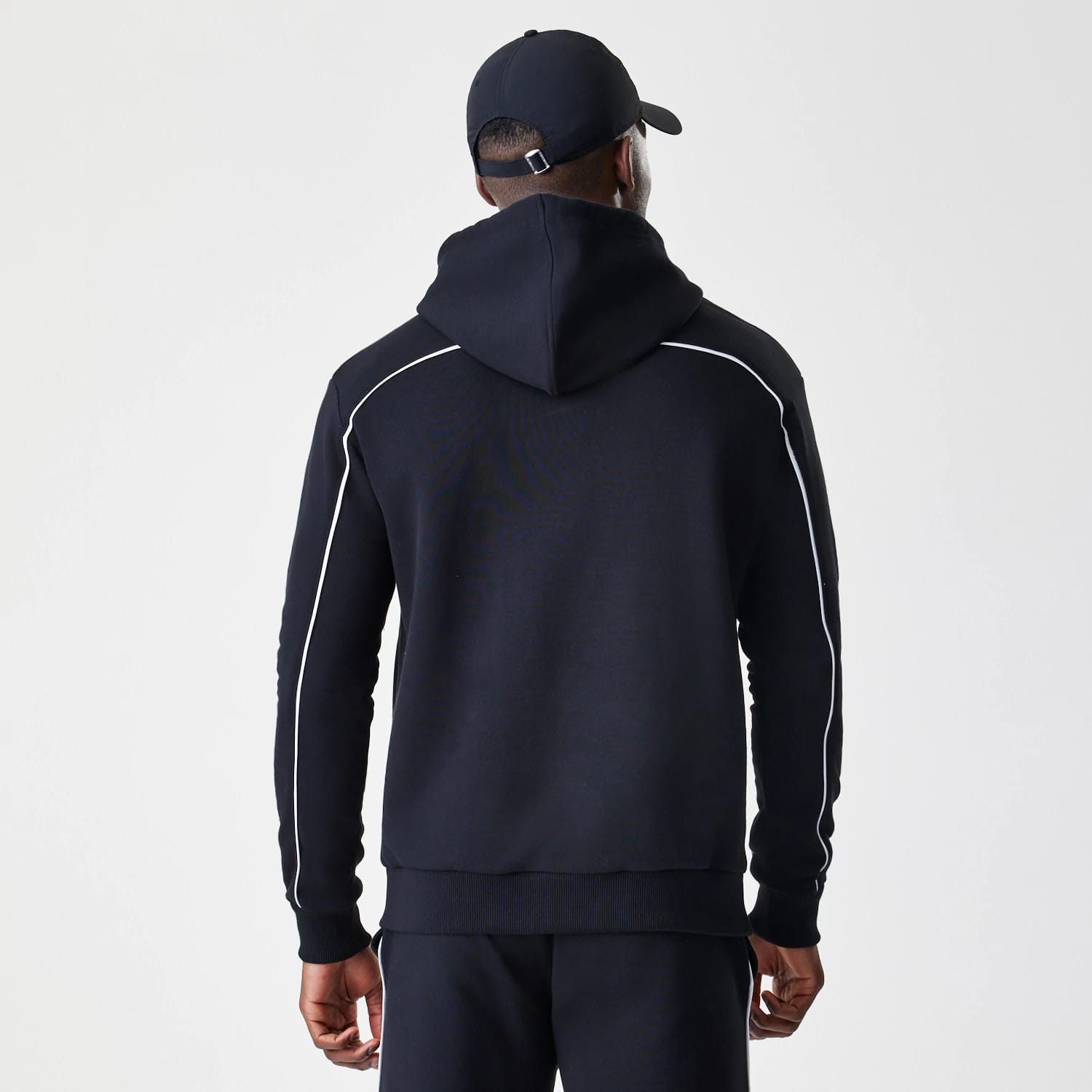 The Male model is wearing Chicago Bulls NBA Piping Black Oversized Pullover Hoodie 2