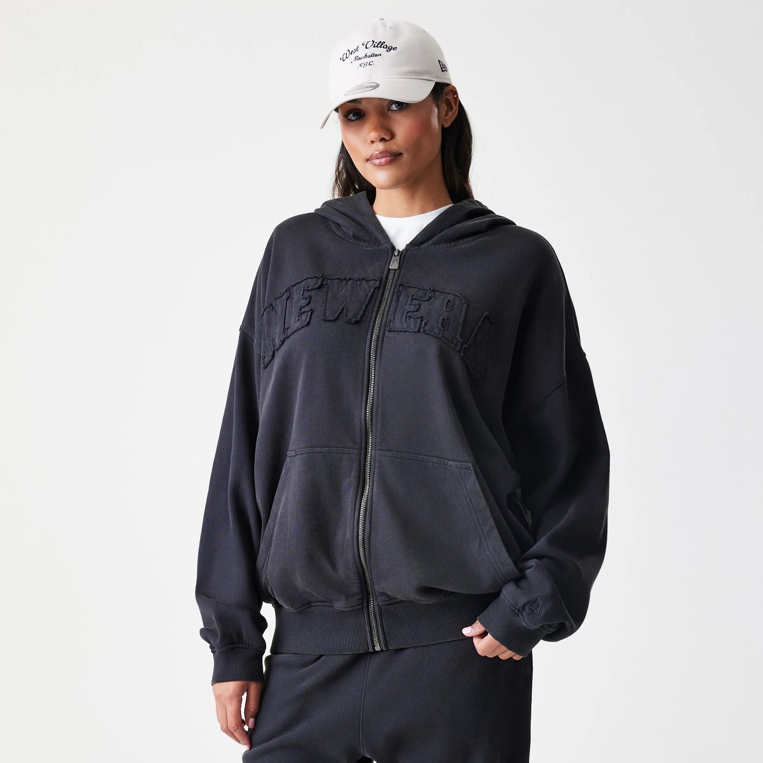 The Male model is wearing  New Era Washed Black Oversized Full Zip Hoodie 4