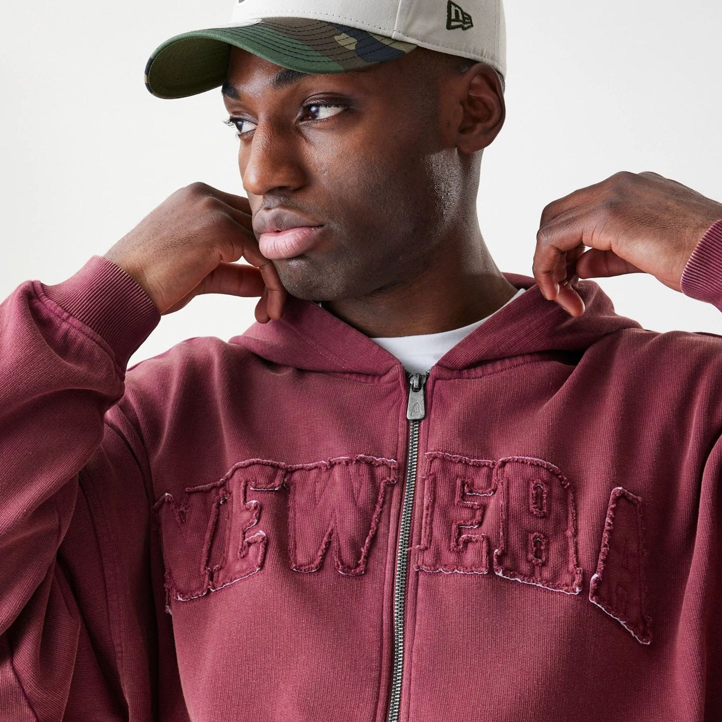 The Male model is wearing  New Era Washed Dark Red Oversized Full Zip Hoodie  5