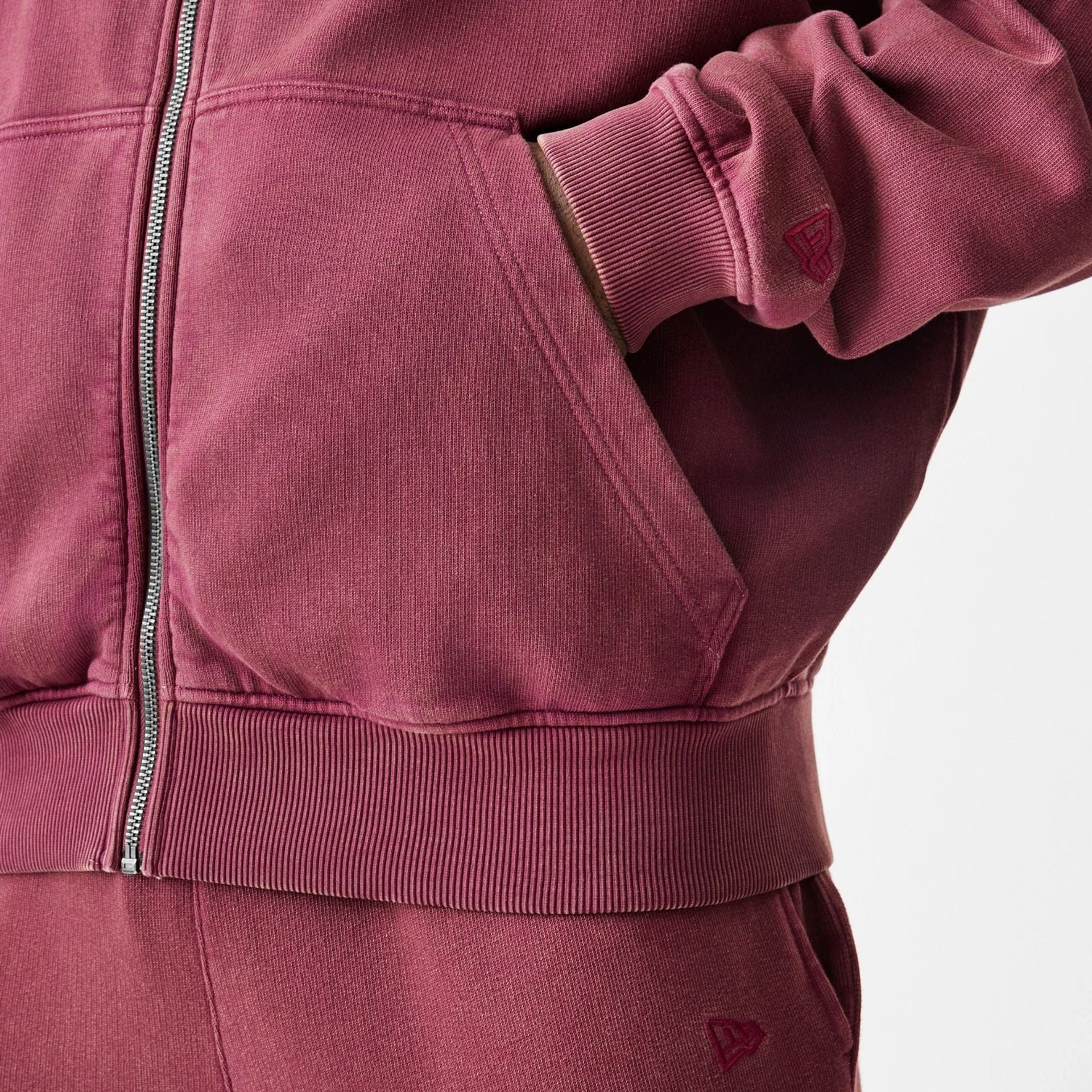 The Male model is wearing  New Era Washed Dark Red Oversized Full Zip Hoodie  7