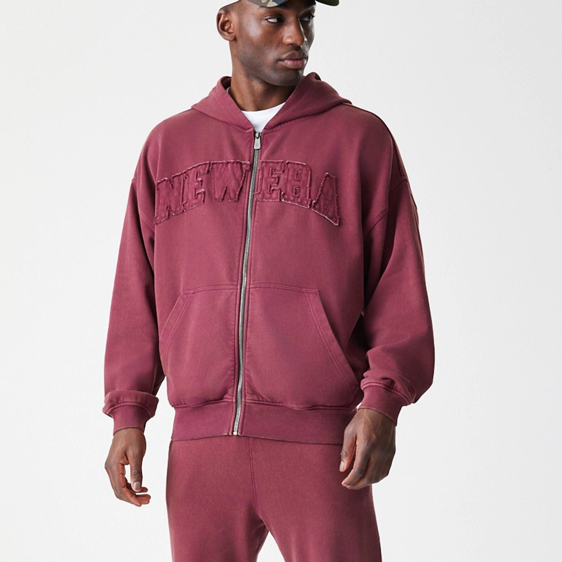 The Male model is wearing  New Era Washed Dark Red Oversized Full Zip Hoodie  8