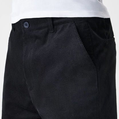 The Male model is wearing  New Era Cord Black Straight Leg Chinos 3