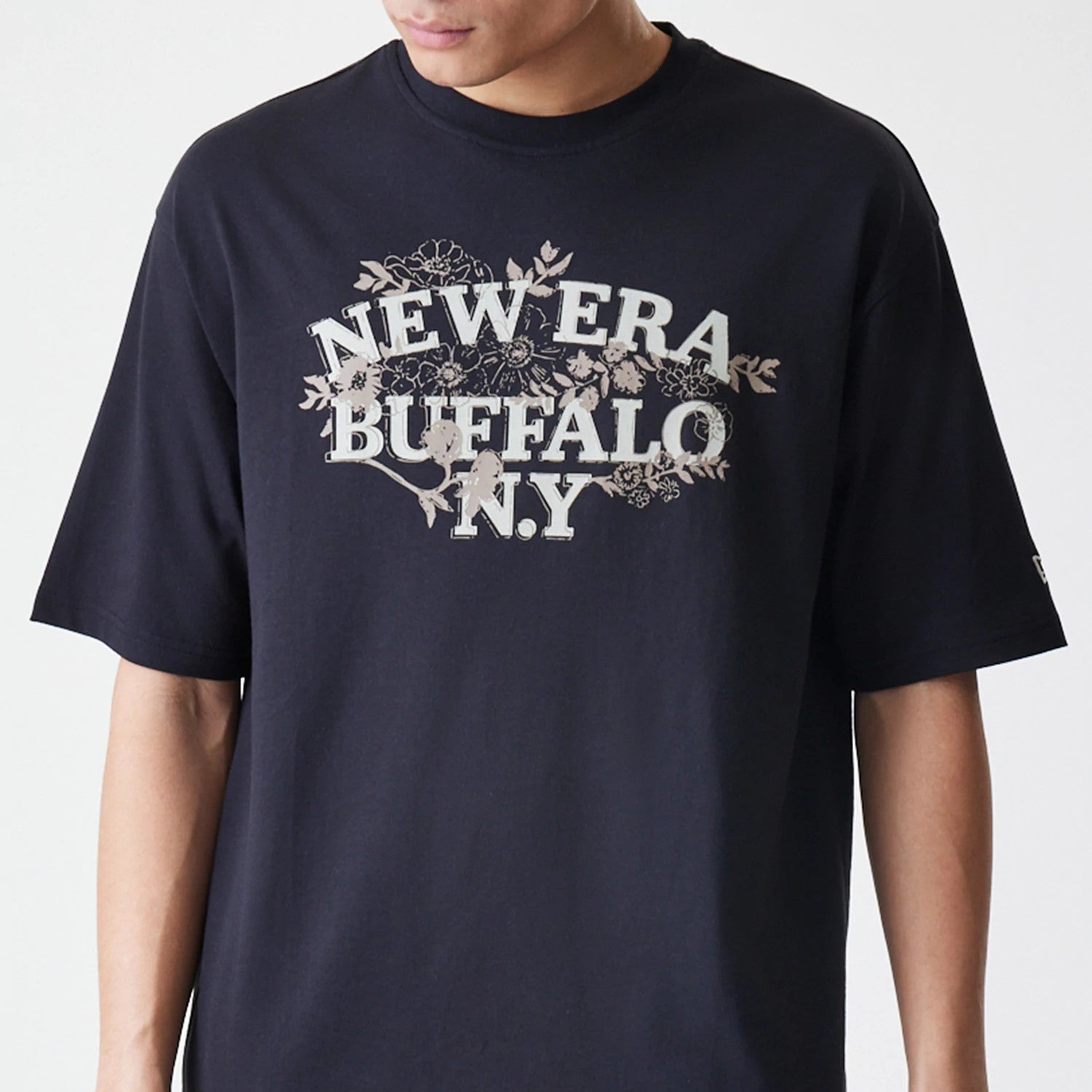 The Male model is wearing  New Era Floral Black Oversized T-Shirt 3