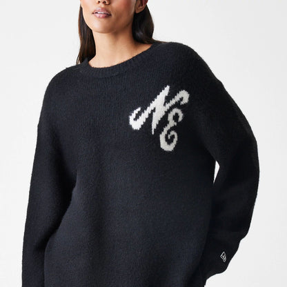 The Male model is wearing New Era Knit Black Knitted Sweater 6