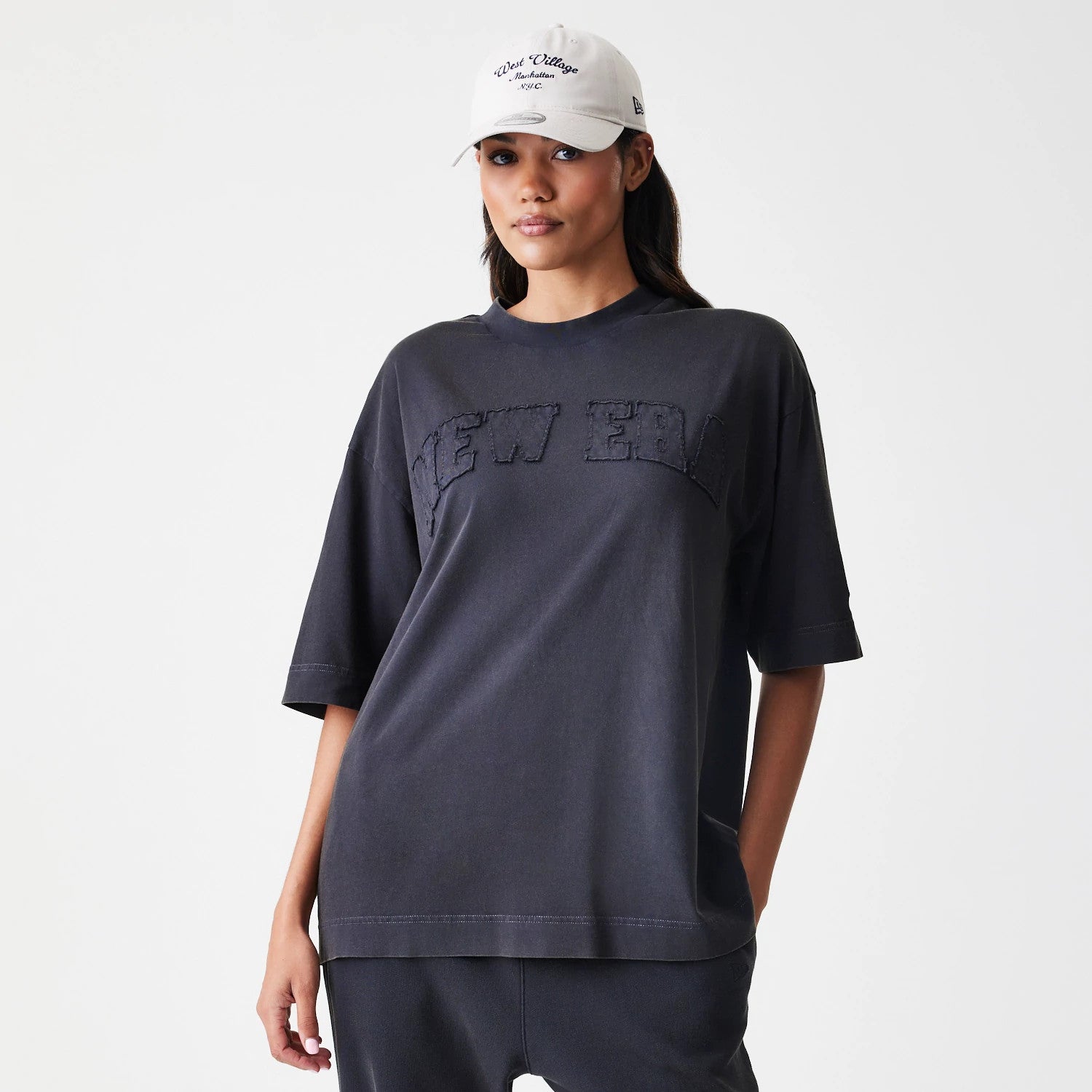 The Male model is wearing  New Era Washed Black Oversized T-Shirt 4