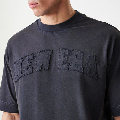 The Male model is wearing  New Era Washed Black Oversized T-Shirt  5