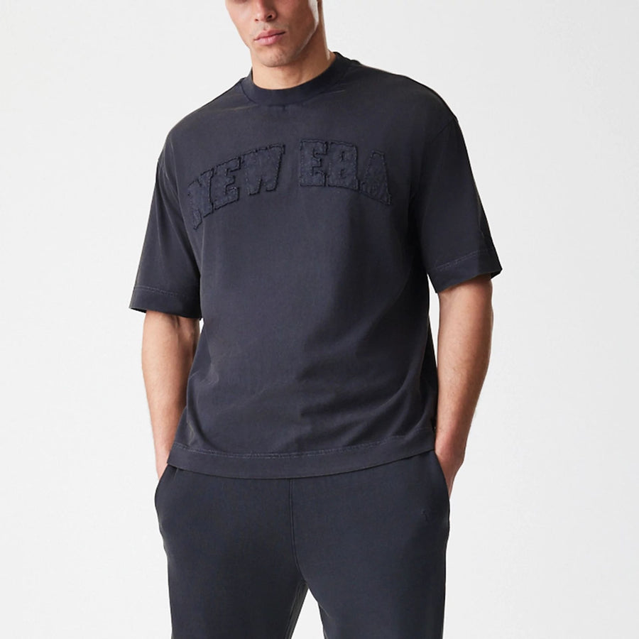 The Male model is wearing  New Era Washed Black Oversized T-Shirt  6