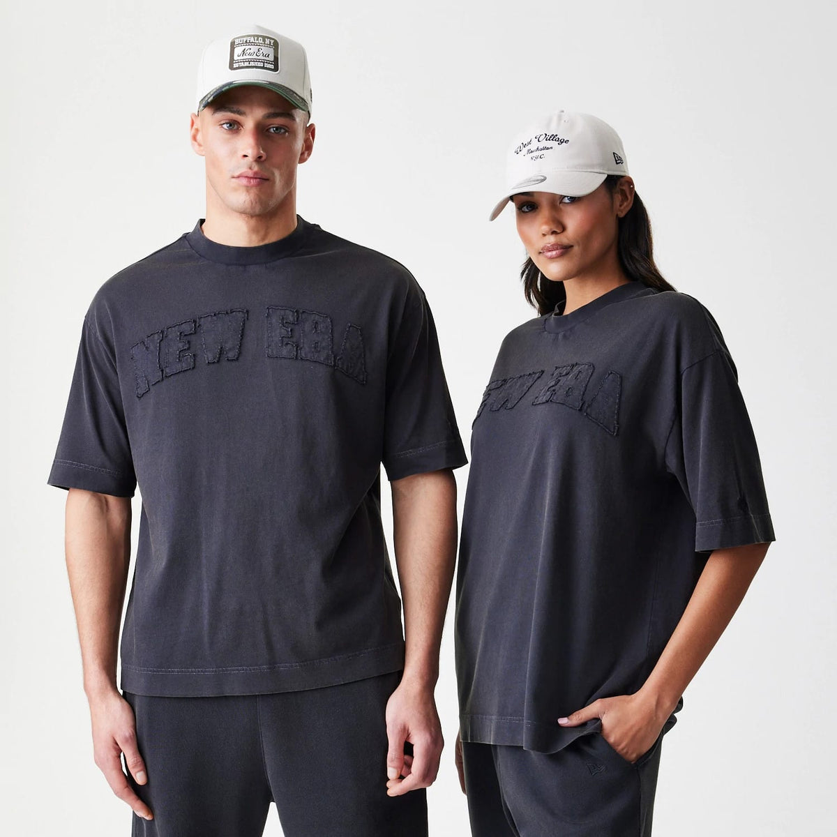 The Male model is wearing  New Era Washed Black Oversized T-Shirt 1