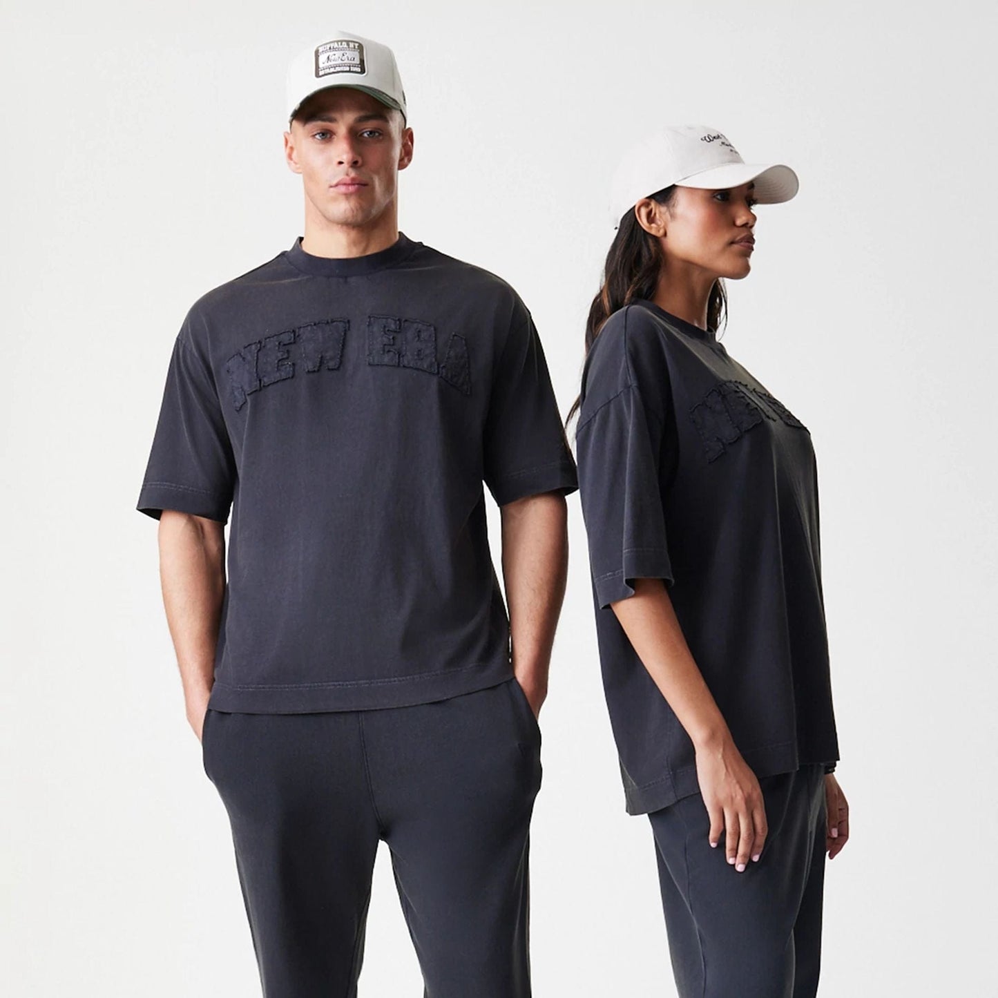 The Male model is wearing  New Era Washed Black Oversized T-Shirt  8