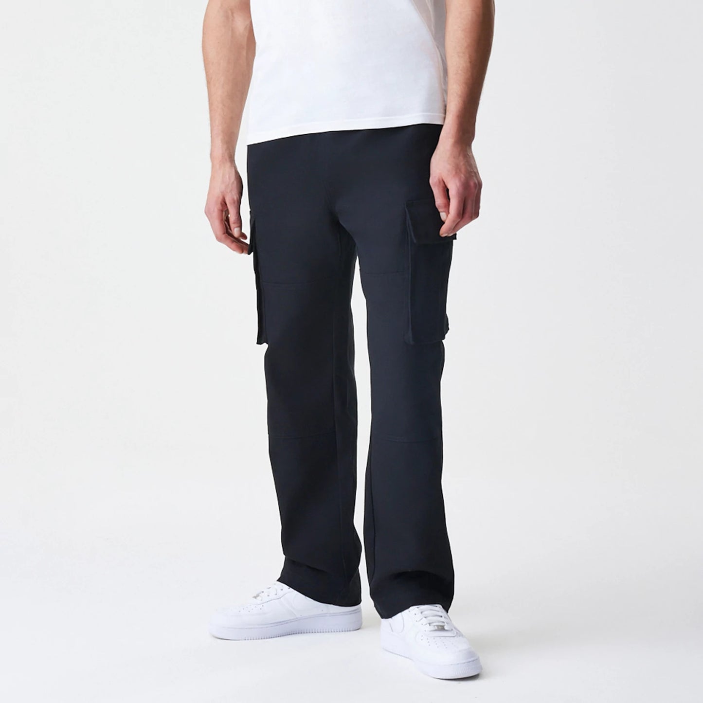 The Male model is wearing  New Era Cargo Black Straight Leg Trousers 3