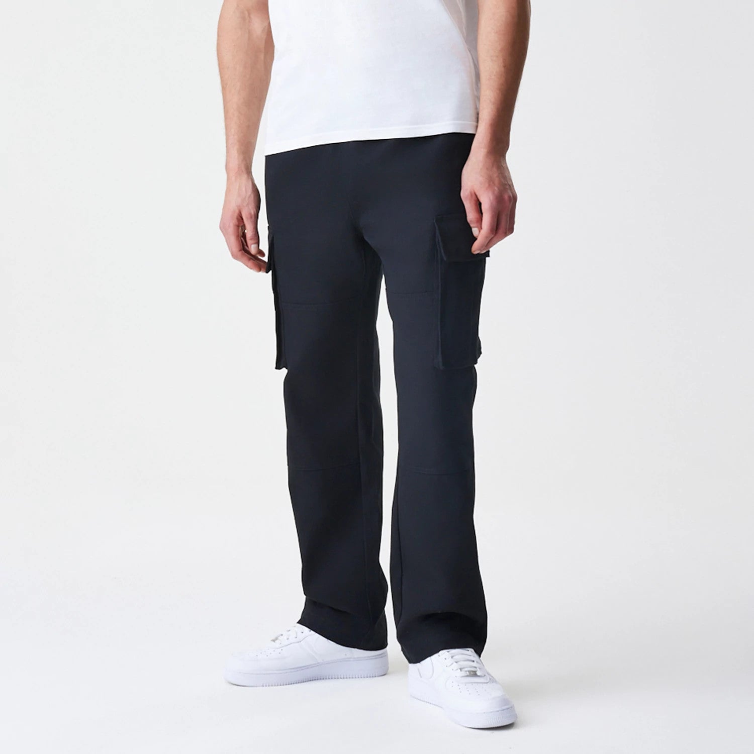 The Male model is wearing  New Era Cargo Black Straight Leg Trousers 3