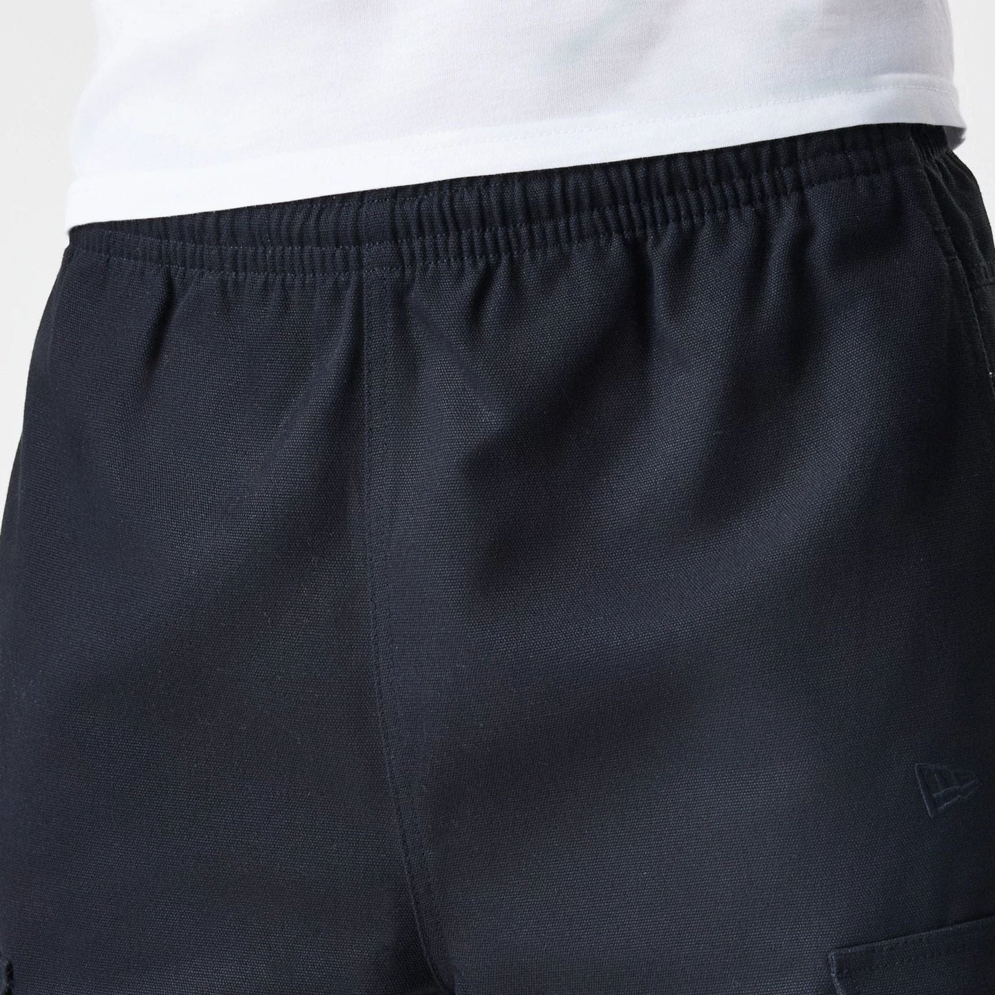 The Male model is wearing  New Era Cargo Black Straight Leg Trousers  6