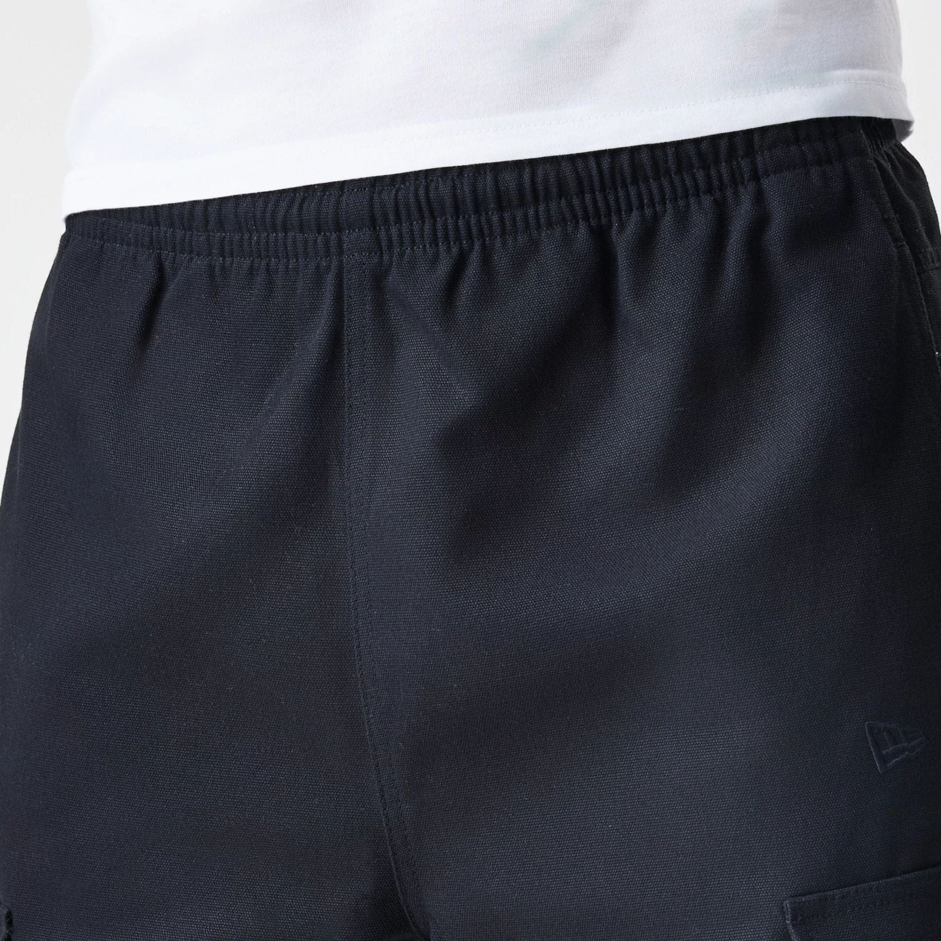 The Male model is wearing  New Era Cargo Black Straight Leg Trousers  6