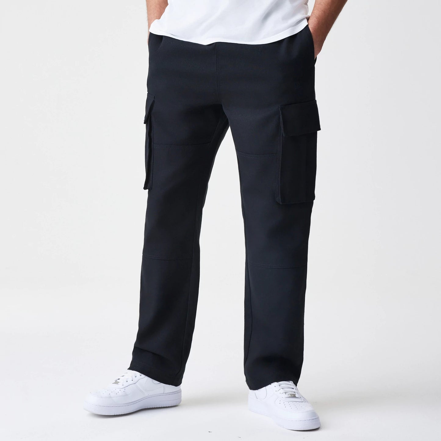 The Male model is wearing  New Era Cargo Black Straight Leg Trousers 1