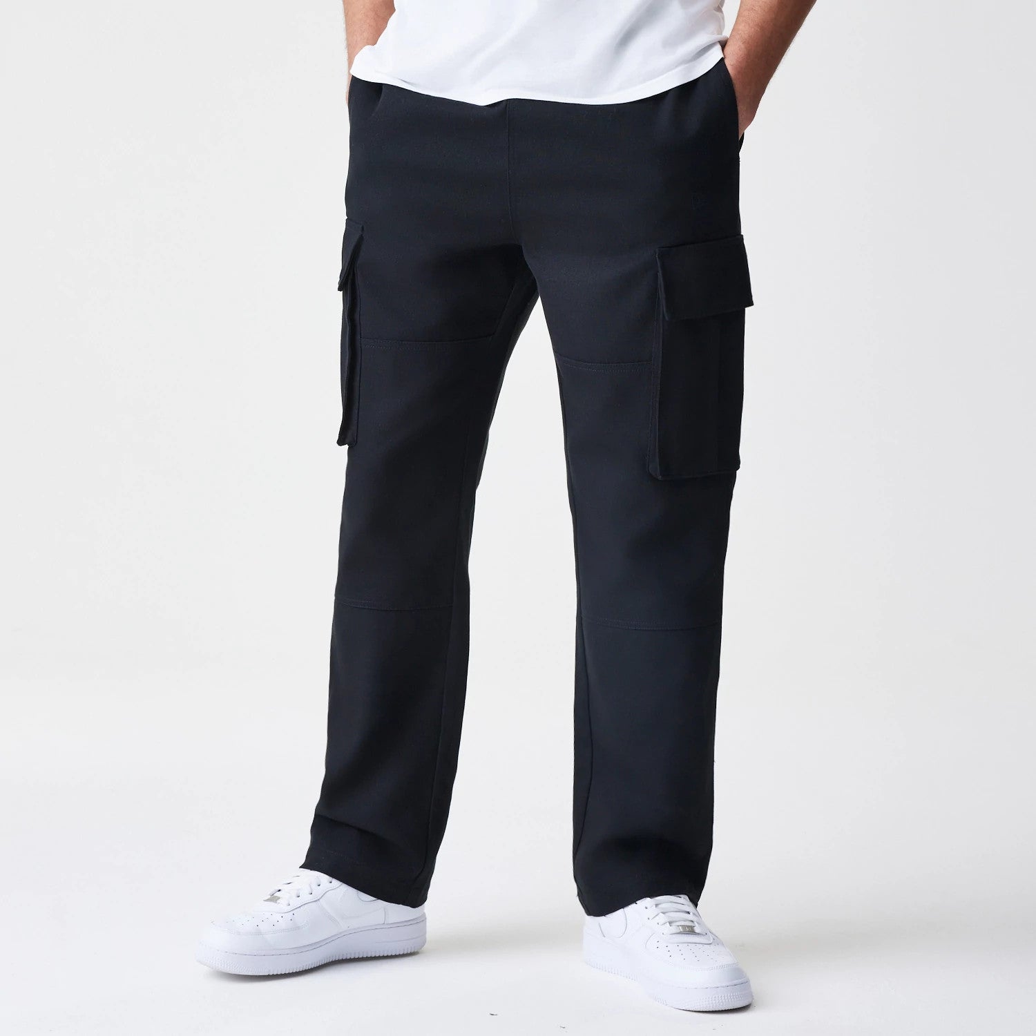The Male model is wearing  New Era Cargo Black Straight Leg Trousers 1