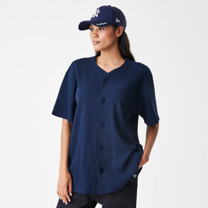 The Male model is wearing  New Era Waffle Navy Jersey 4