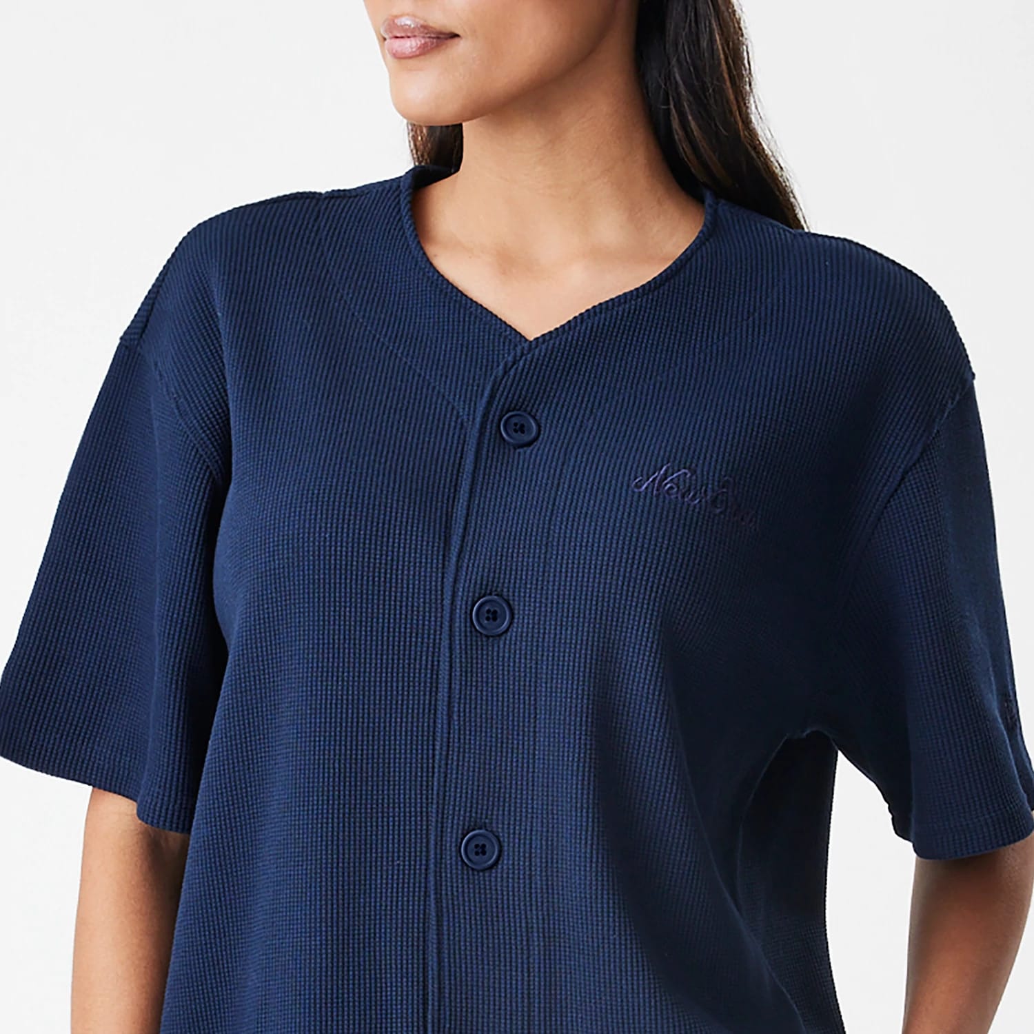 The Male model is wearing  New Era Waffle Navy Jersey 6