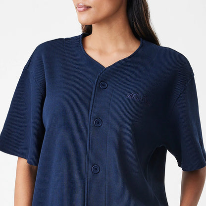 The Male model is wearing  New Era Waffle Navy Jersey 6