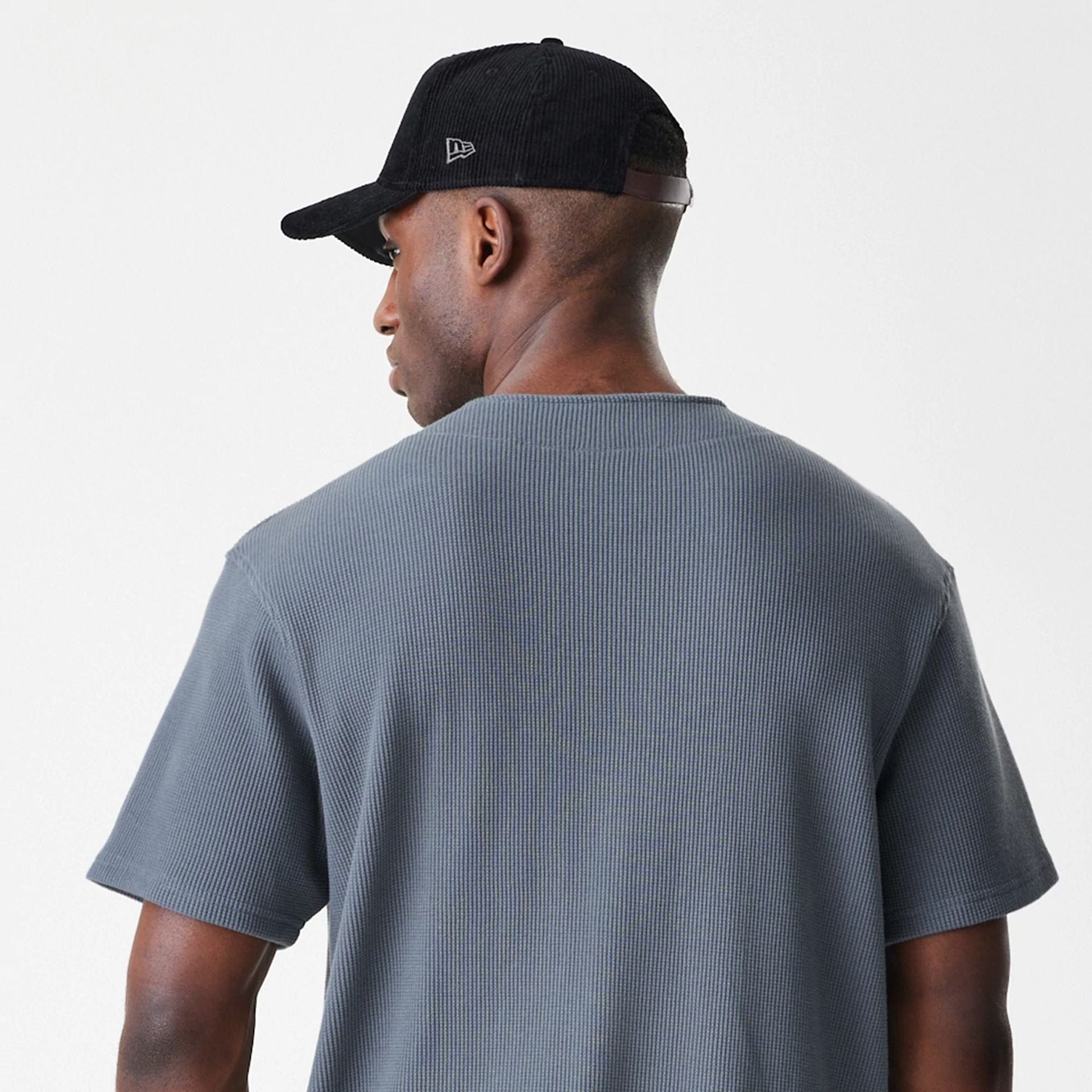 The Male model is wearing  New Era Waffle Dark Grey Jersey  5