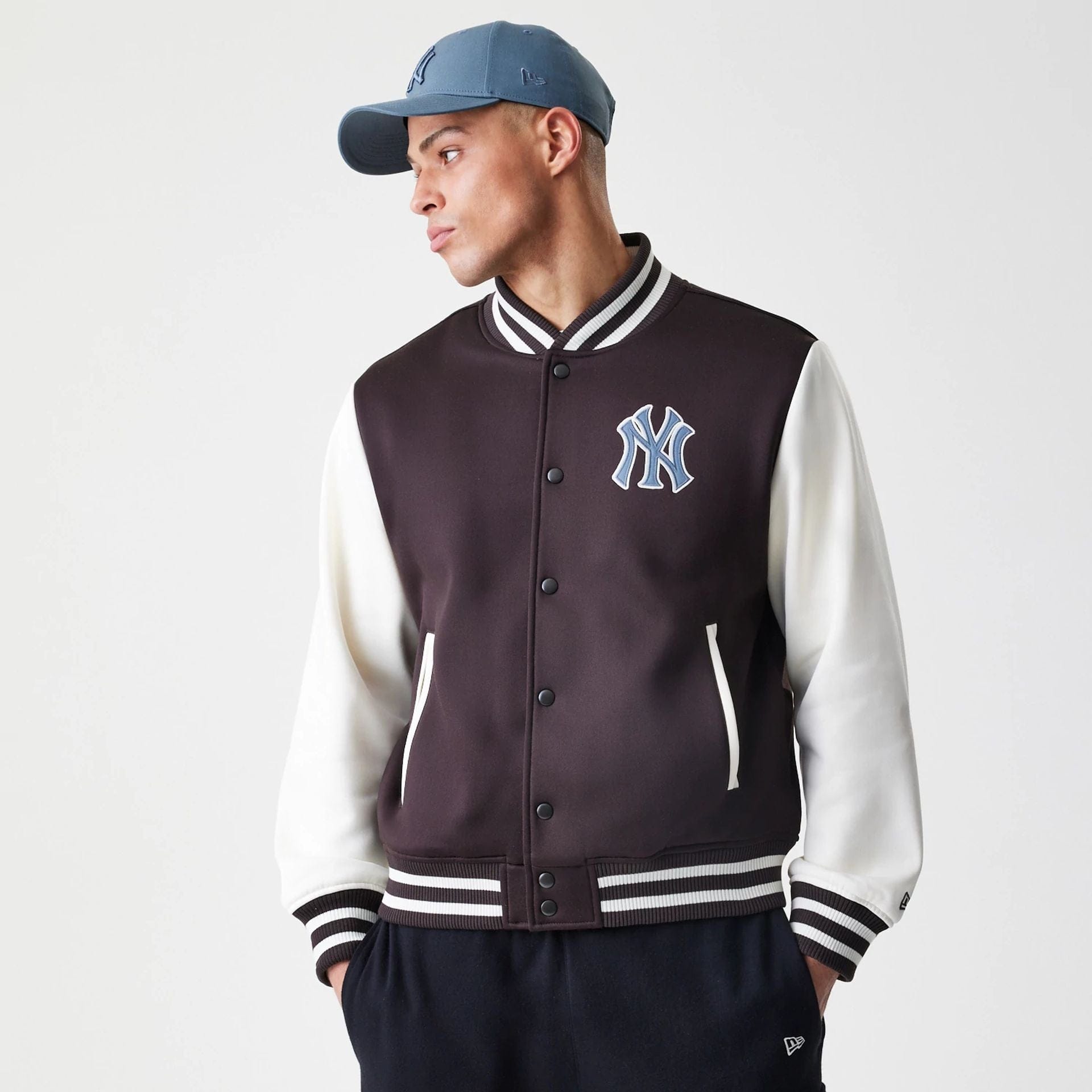 The Male model is wearing New York Yankees MLB Dark Brown Varsity Jacket  3