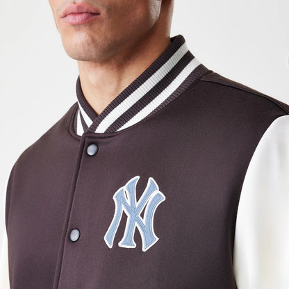 The Male model is wearing New York Yankees MLB Dark Brown Varsity Jacket 5