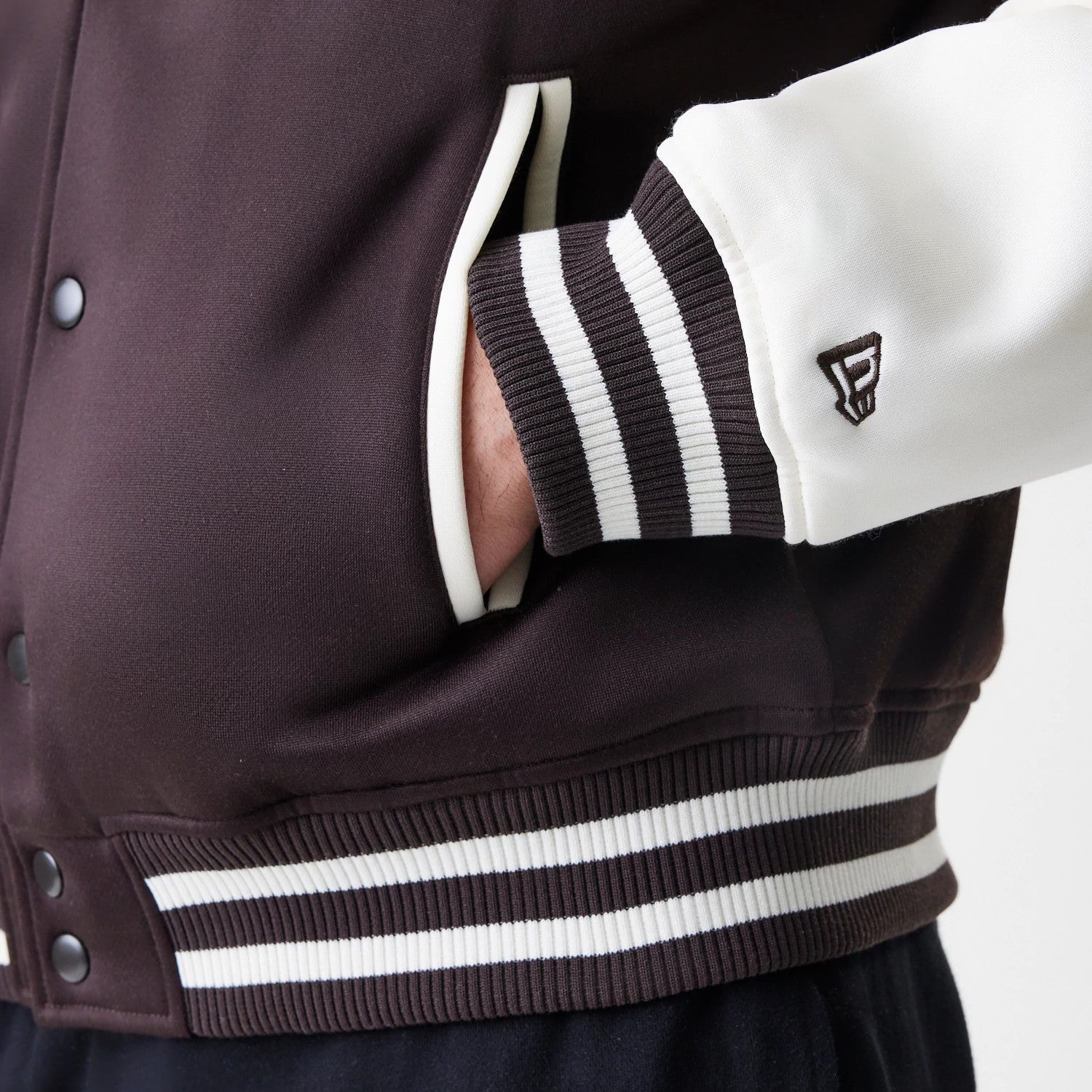The Male model is wearing New York Yankees MLB Dark Brown Varsity Jacket 7