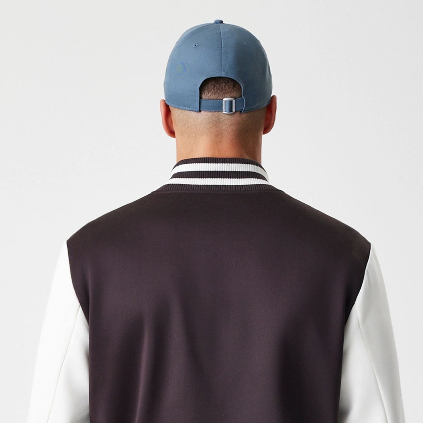 The Male model is wearing New York Yankees MLB Dark Brown Varsity Jacket  8