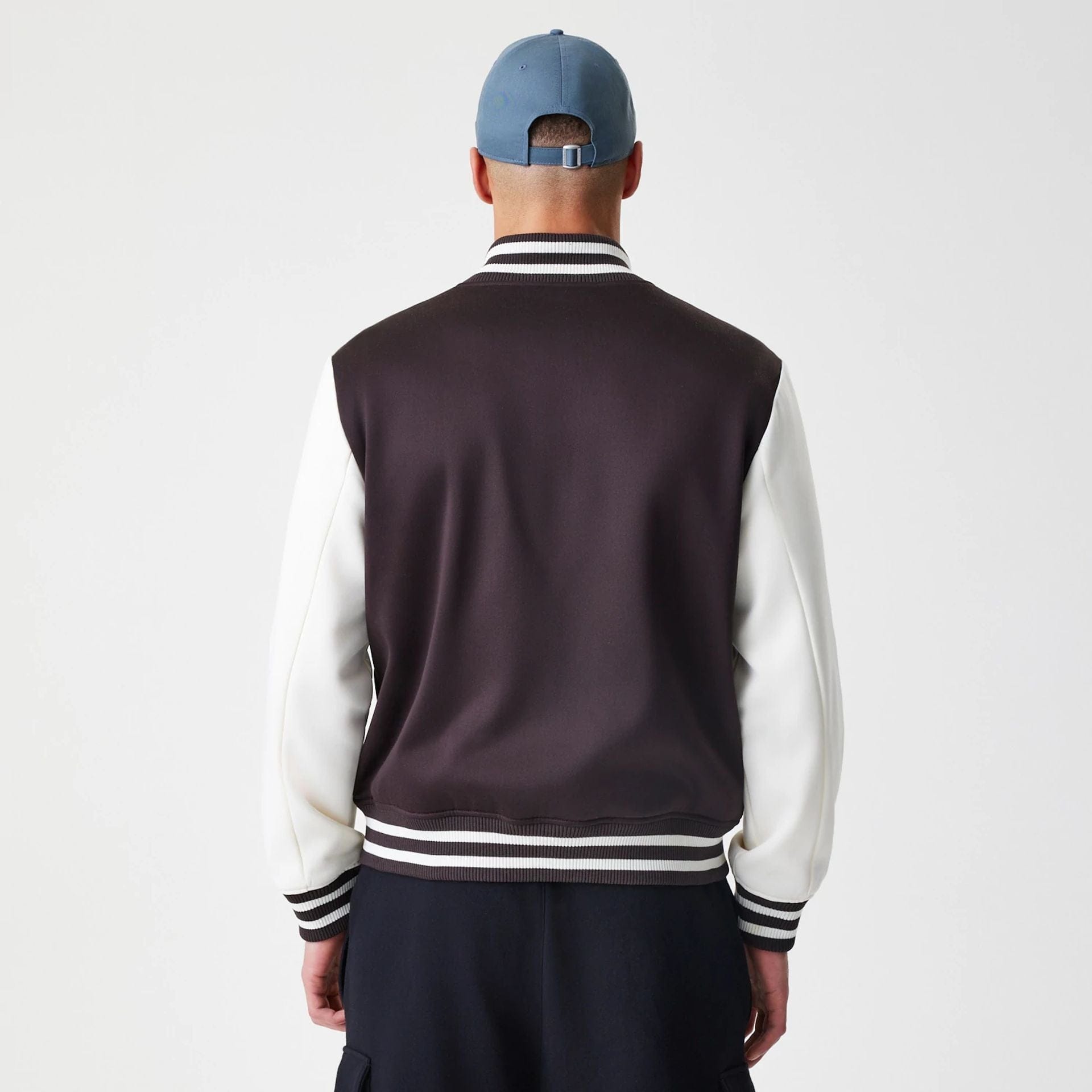 The Male model is wearing New York Yankees MLB Dark Brown Varsity Jacket 2