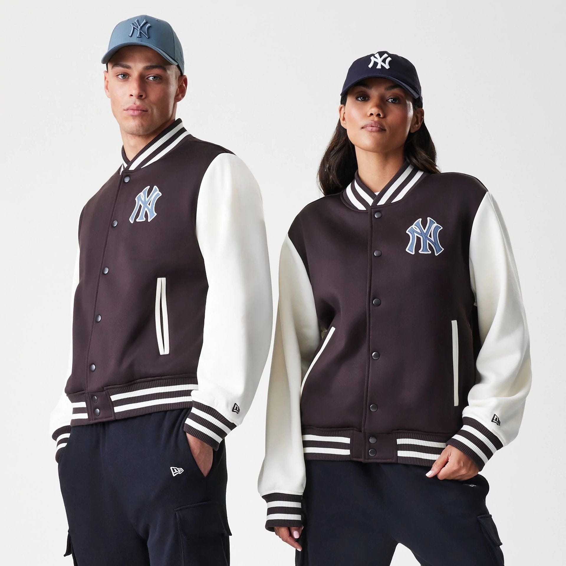 The Male model is wearing New York Yankees MLB Dark Brown Varsity Jacket  1