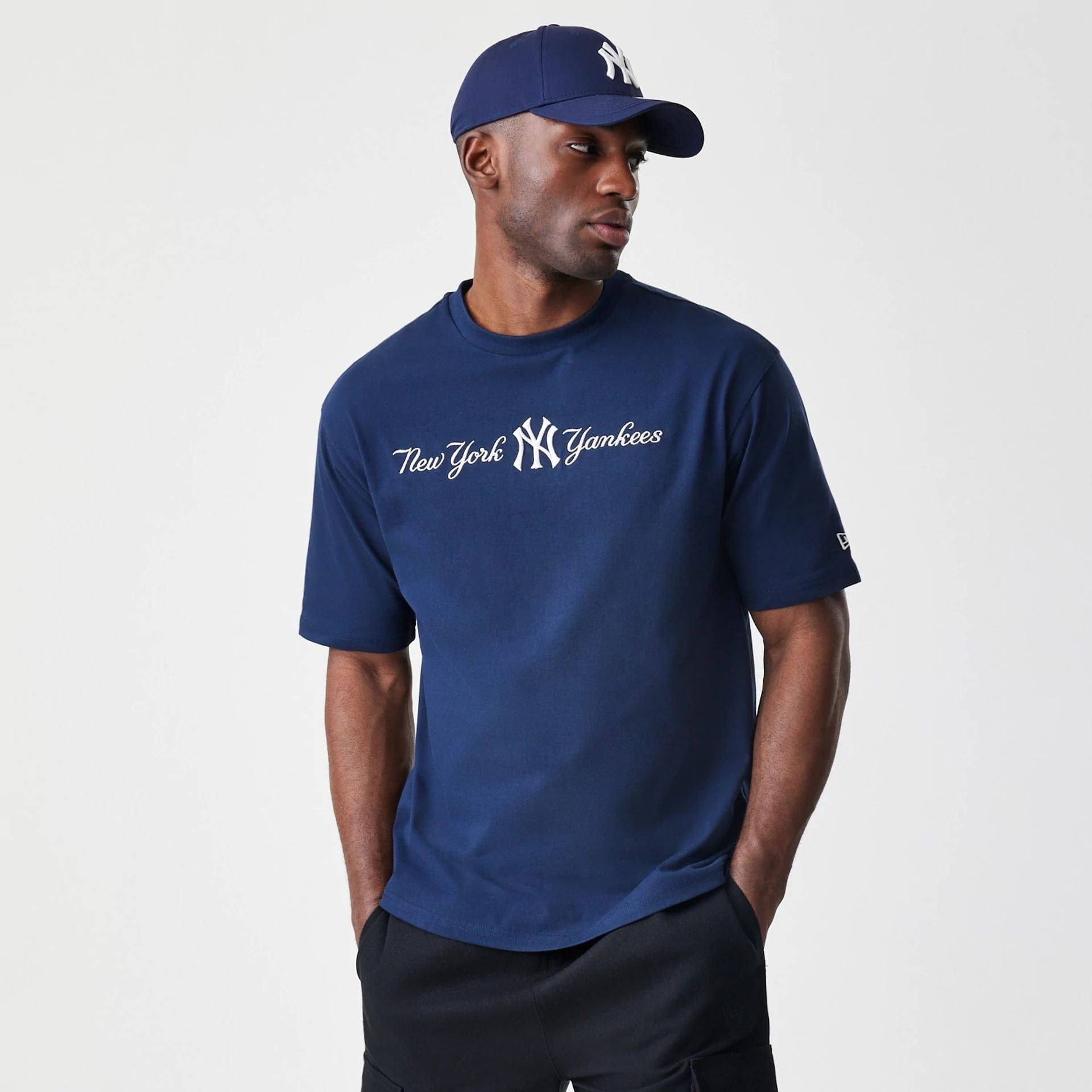 The Male model is wearing New York Yankees MLB Script Navy Oversized T-Shirt  1