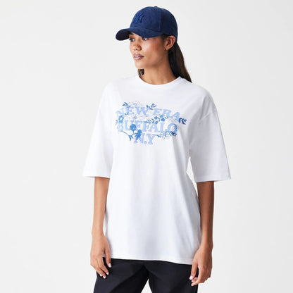 The Male model is wearing  New Era Floral White Oversized T-Shirt  4