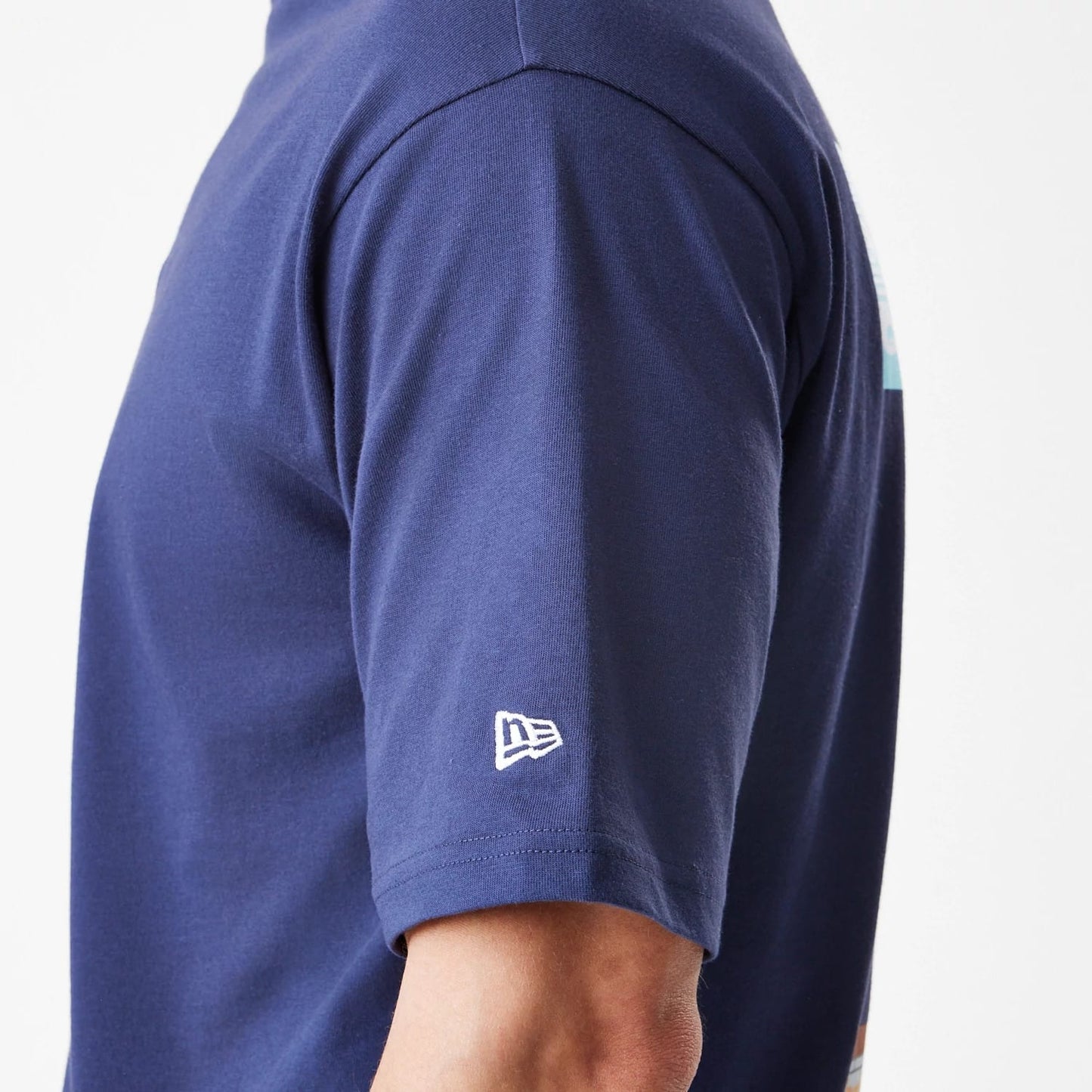The Male model is wearing  New Era Location Navy Oversized T-Shirt 7