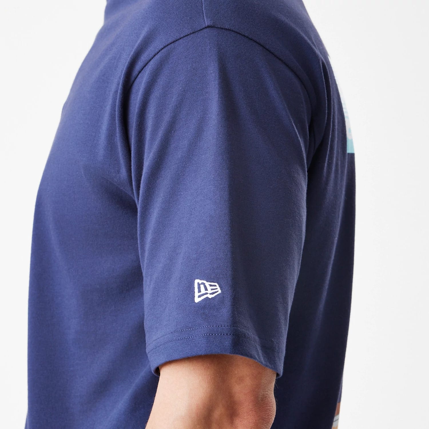 The Male model is wearing  New Era Location Navy Oversized T-Shirt 7