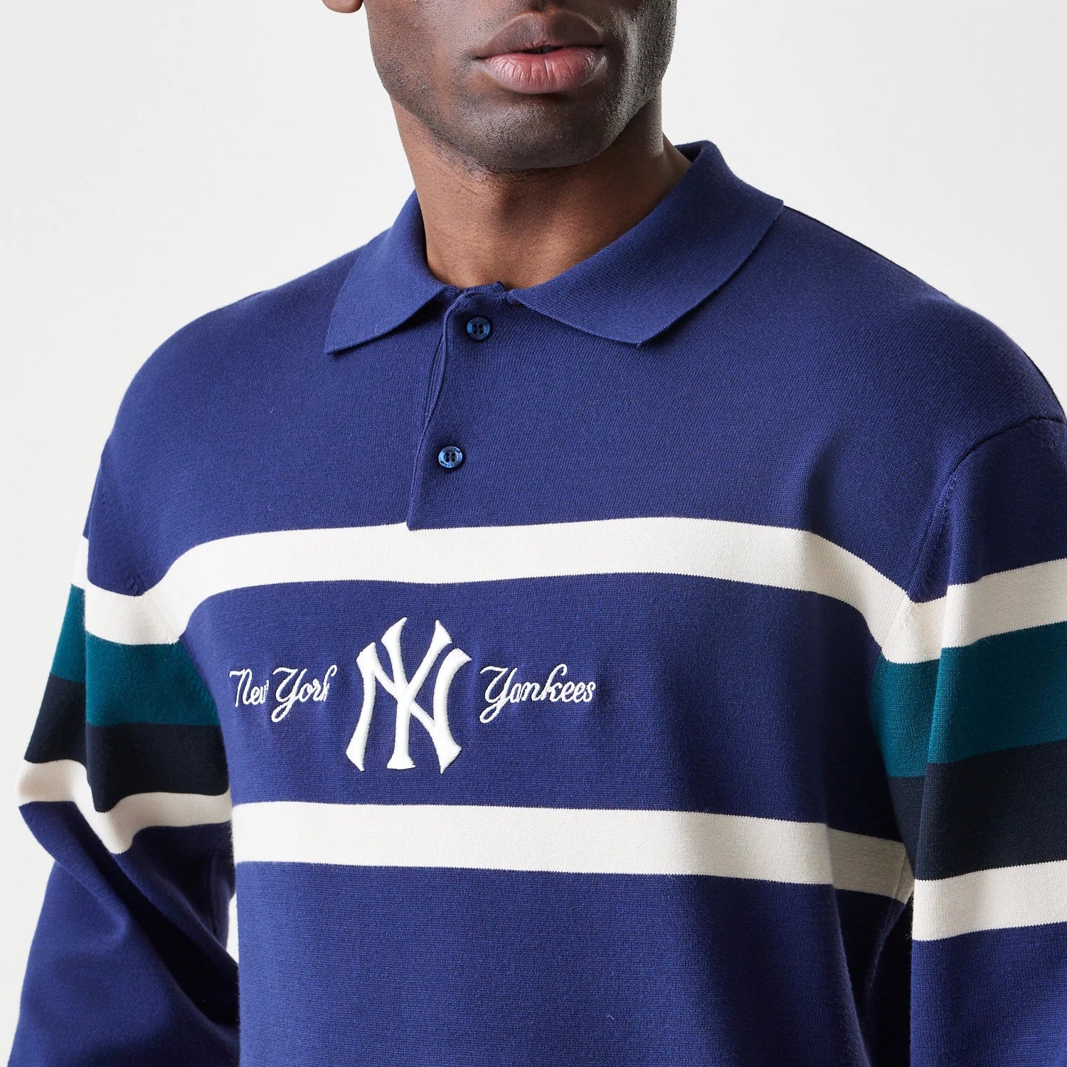 The Male model is wearing New York Yankees MLB Knit Navy Rugby Shirt 5