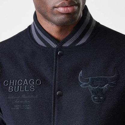 The Male model is wearing Chicago Bulls NBA Tonal Black Varsity Jacket  7