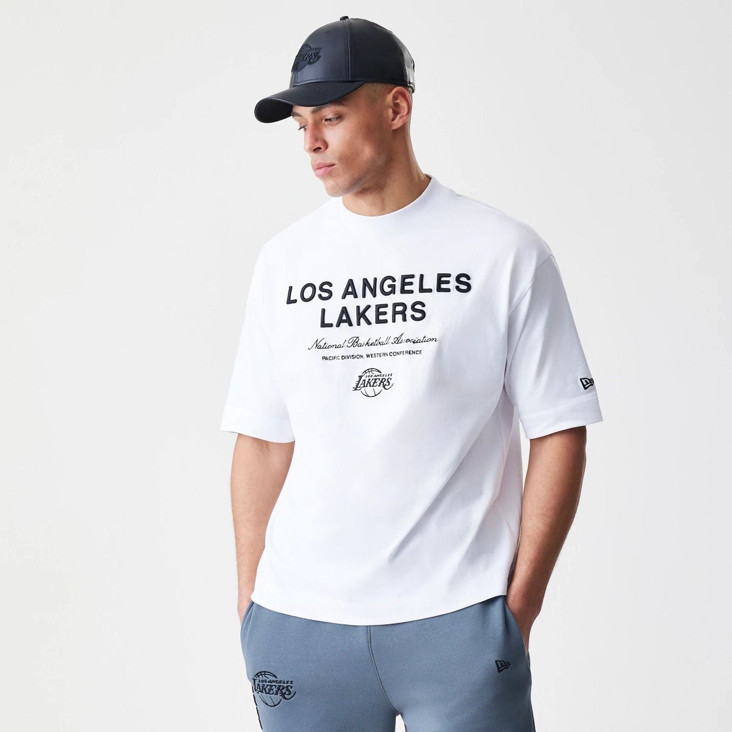 The Male model is wearing LA Lakers NBA Linear White T-Shirt  3