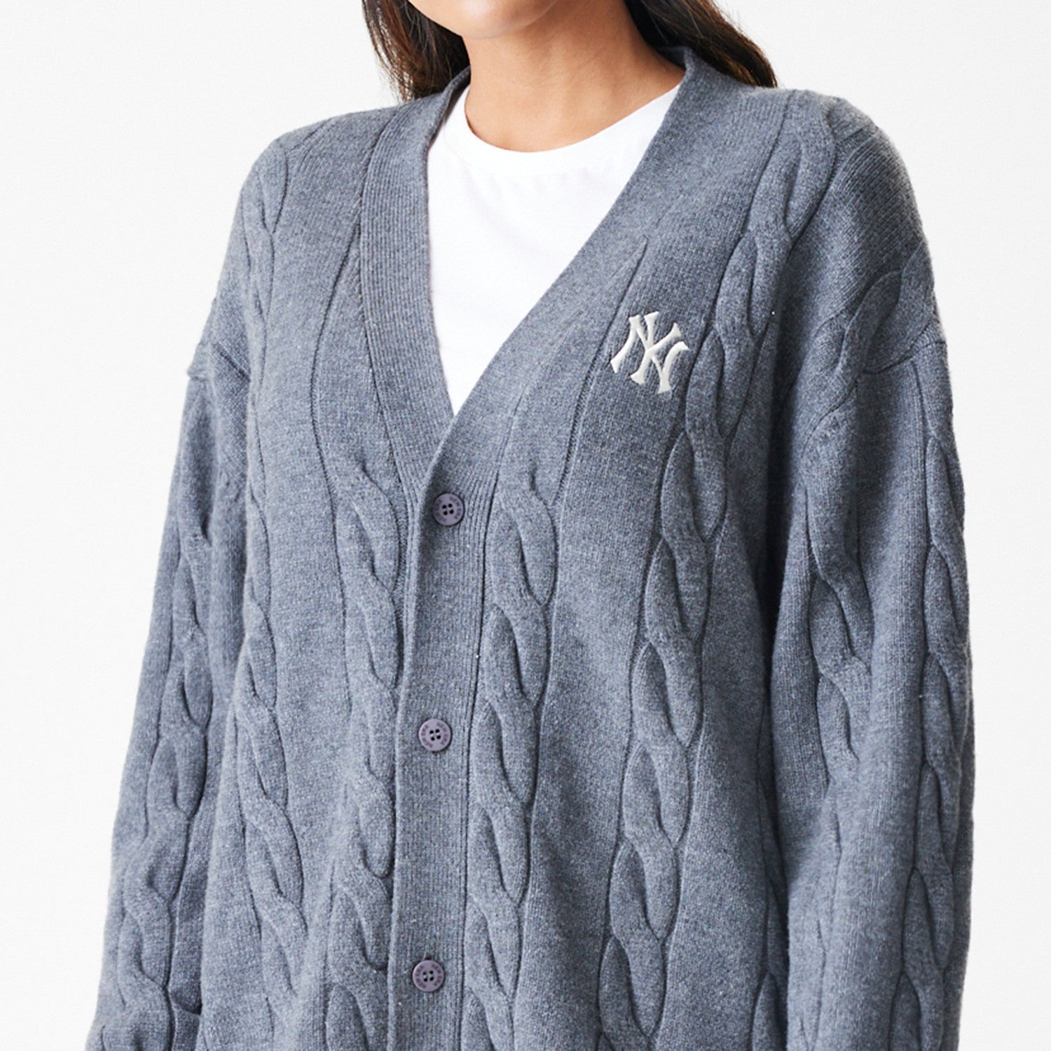 The Male model is wearing New York Yankees MLB Cable Knit Dark Grey Cardigan 6