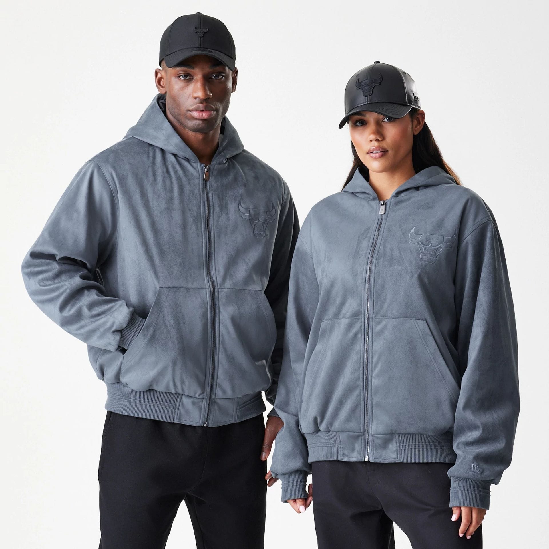 The Male model is wearing Chicago Bulls NBA Suede Dark Grey Jacket 1