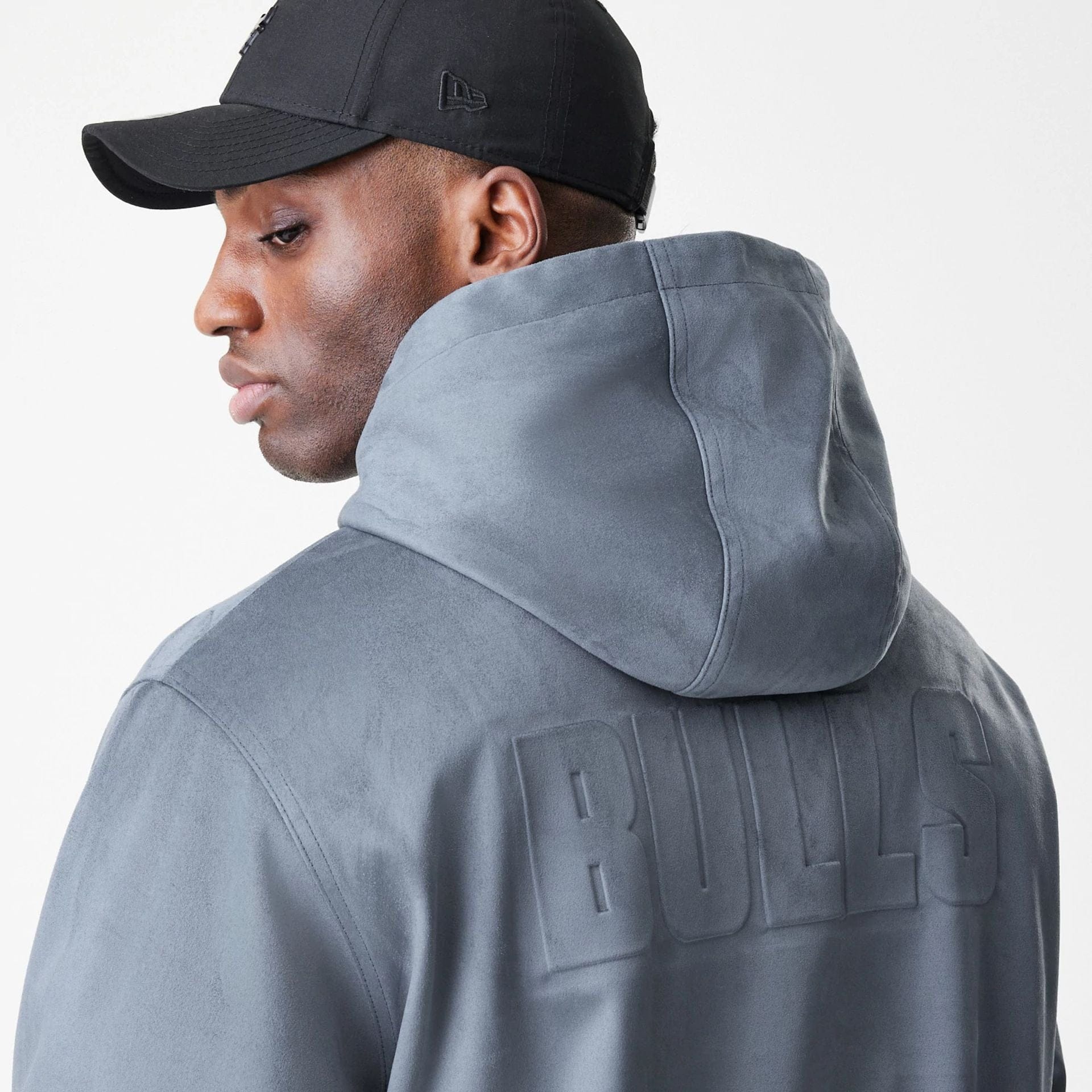 The Male model is wearing Chicago Bulls NBA Suede Dark Grey Jacket 8