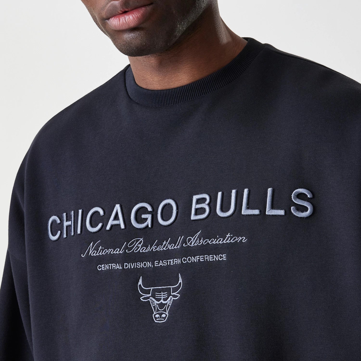 The Male model is wearing Chicago Bulls NBA Linear Black Crew Neck Sweater 4