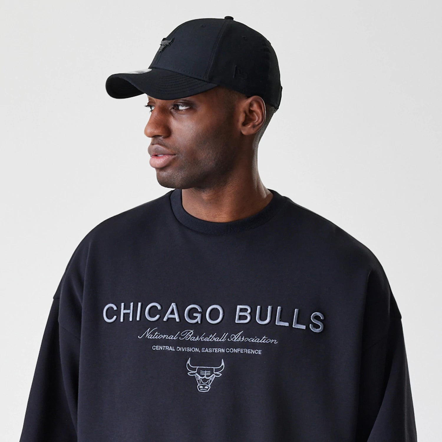 The Male model is wearing Chicago Bulls NBA Linear Black Crew Neck Sweater 6