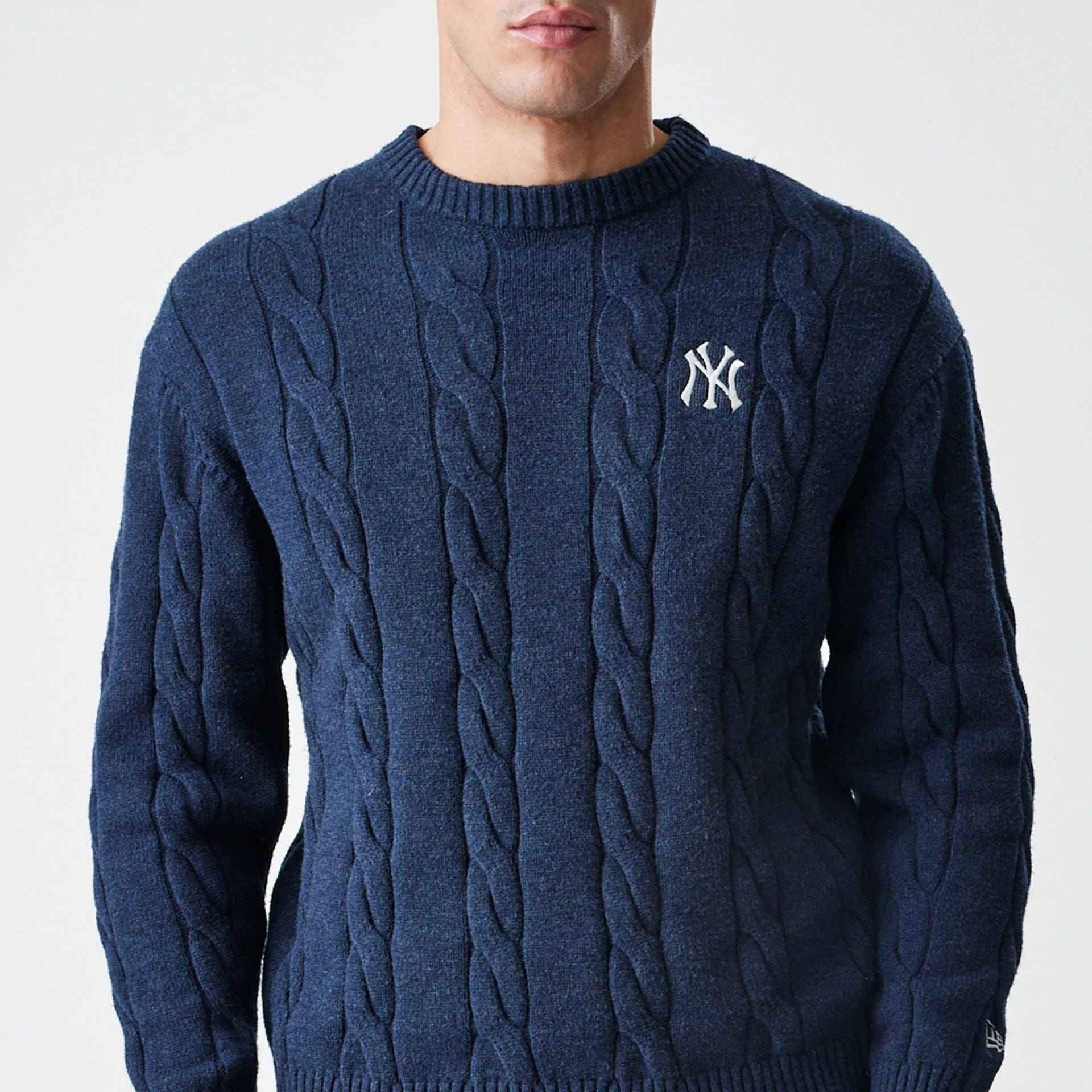 The Male model is wearing New York Yankees MLB Cable Knit Navy Knitted Sweater 3