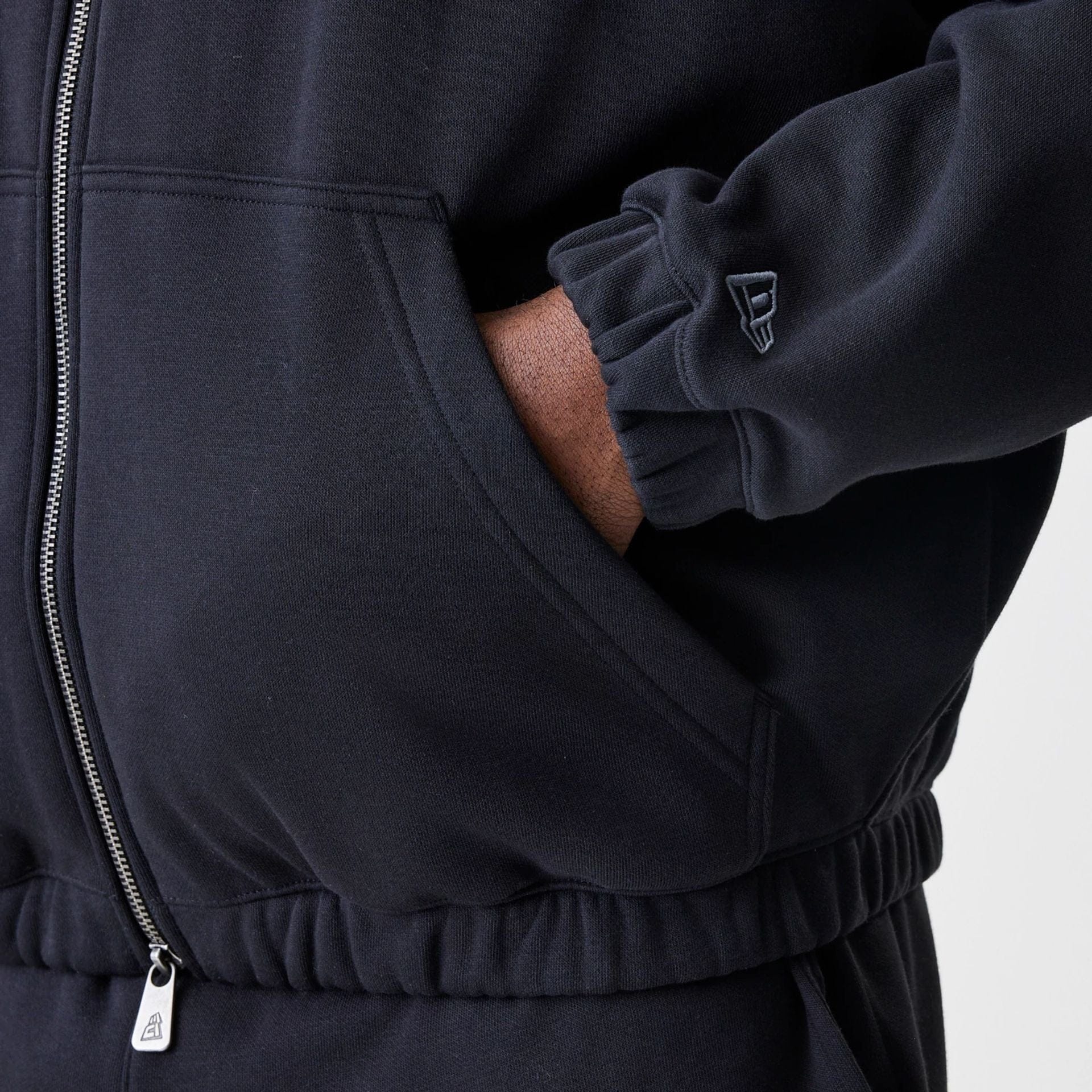 The Male model is wearing Chicago Bulls NBA Linear Black Oversized Full Zip Hoodie  5