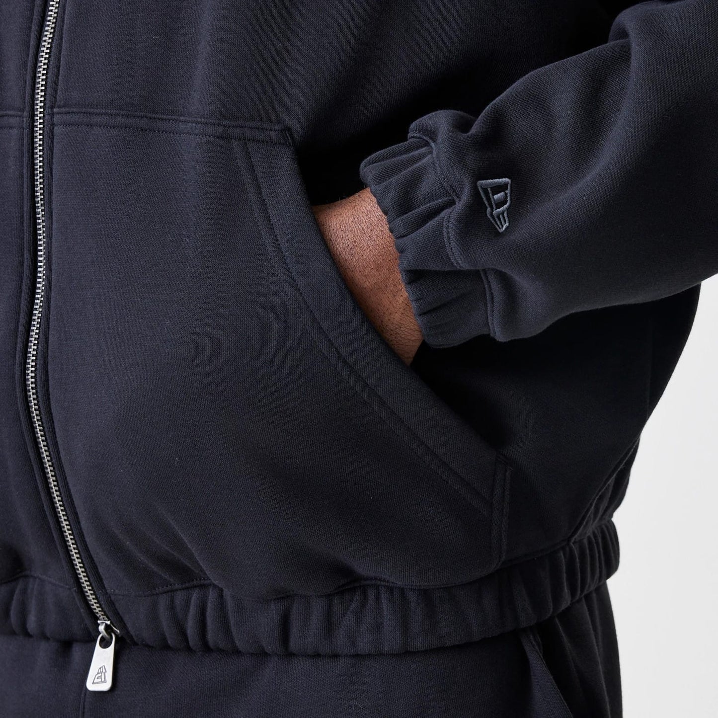 The Male model is wearing Chicago Bulls NBA Linear Black Oversized Full Zip Hoodie 5